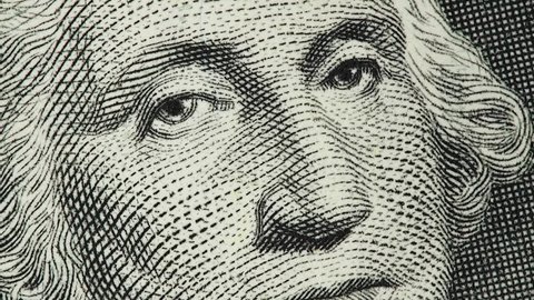 US President George Washington on USA one dollar bill macro rotating, 