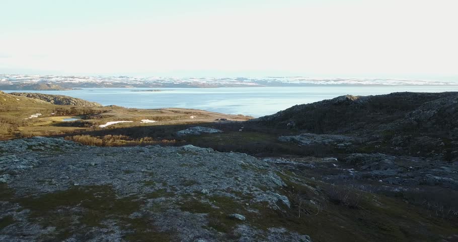 Aerial Footage of Beautiful Norway Landscape with rocks and sea.