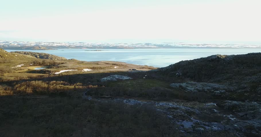 Aerial Footage of Beautiful Norway Landscape with rocks and sea.