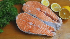 Red salmon fish with lemon and spice cooking 