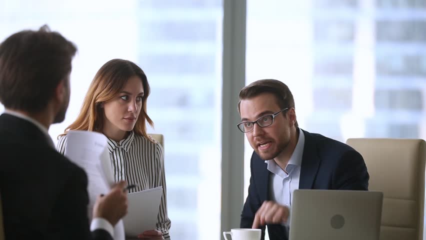 Dissatisfied mad businessmen arguing shouting on bad contract meeting lawyer, angry client yell having complaint conflict blame partner in fraud, legal dispute on terms change at office negotiations | Shutterstock HD Video #1022497288