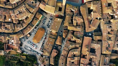 Aerial top down view of Siena cityscape involving famous Piazza del Campo or Campo Square. Tuscany, Italy