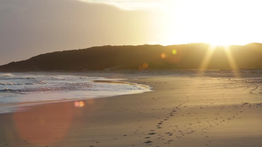 pan over beach Australia beautiful sunlight