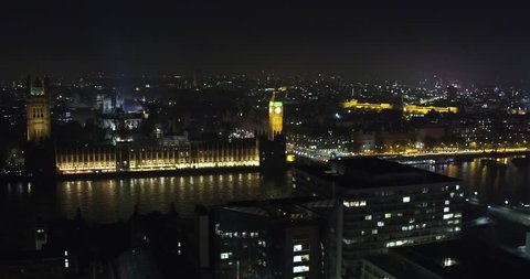 Aerial drone shot of the Big Ben London by night. This shot is made before the renovation started. Perfect for Brexit use.