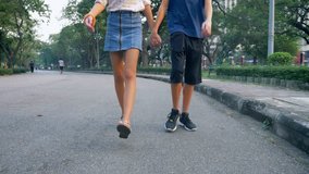 Portrait of teenagers, boy and girl walking in nature in a big park with pleasure, brother and sister twins are walking together in a city park - Powered by Shutterstock - Get 15% off with code: PIKWIZARD15