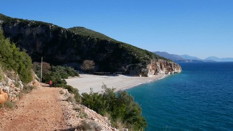 bay, beach and calcareous canyon of Gjipe with Corfu island in background, Vlore, Albania
