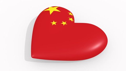 Heart in colors and symbols of China on white background, loop