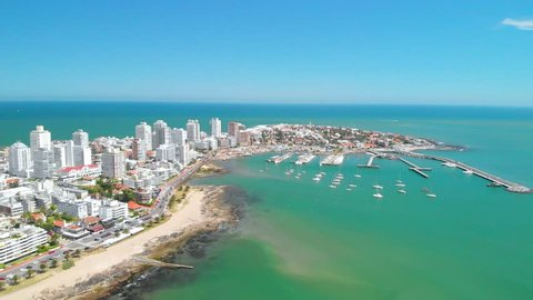 Punta del Este, Uruguay: Flying near downtown with a great view to some buildings and yatches at the port