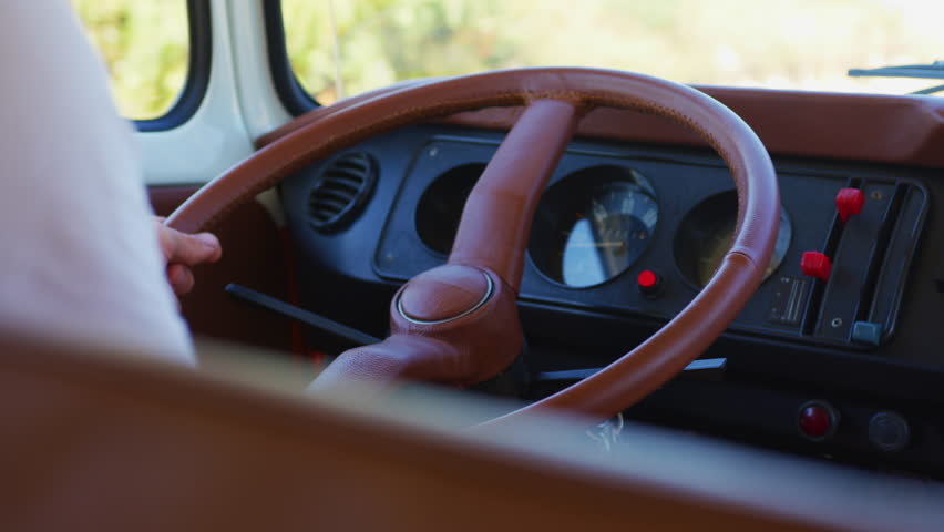 Dashboard and steering wheel of a campervan. | Shutterstock HD Video #1022576539