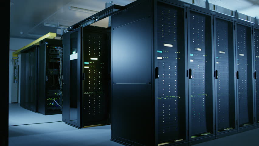 Arc Shot of Data Center With Multiple Rows of Fully Operational Server Racks. Modern Telecommunications, Cloud Computing, Artificial Intelligence, Database, Super Computer Technology Concept. Royalty-Free Stock Footage #1022590609