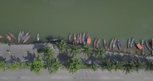 Aerial view panorama of Hoi An old town or Hoian ancient town. Royalty high-quality free stock video footage top view pier dock river and boat traffic Hoian. Hoi An the most popular travel in Vietnam