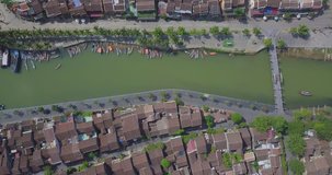 Aerial view panoramic of Hoi An old town or Hoian ancient town. Royalty high-quality free stock video footage top view house, rooftop, river of Hoi An city. Hoian city is the most popular destination