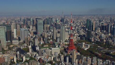 Tokyo, Japan circa-2018. Aerial view of Tokyo Tower and city of Tokyo. Shot from helicopter with RED camera.