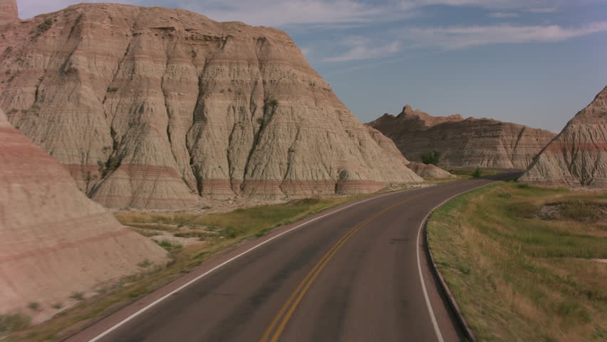 Road through the badlands at Badlands National Park, South Dakota image ...