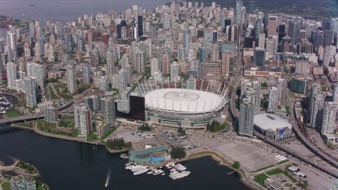 Vancouver, Canada circa-2018. Aerial view of BC Place Stadium and Downtown Vancouver. Shot from helicopter with Cineflex gimbal and RED Epic-W camera.