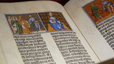 Nuremberg, Germany - December 4, 2018: Medieval old book with illustrations text in ancient German in the museum of the castle