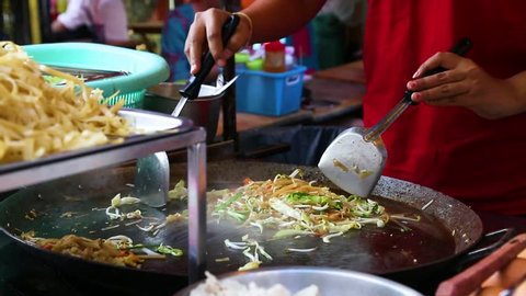 Pad Thai cooking. street food on  food market in Bangkok Thailand 