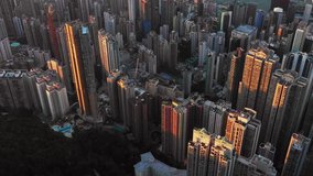 Fly over Urban city scene around Victoria peak and Victoria Harbour with Day light, Hong Kong Transportation, 4k high resolution video