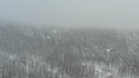 Fog on top of the mountain Veliki Krs in Eastern Serbia 4K aerial footage