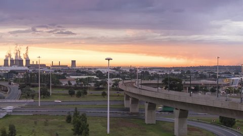 Sunset timelapse from Johannesburg Airport (Oliver Tambo) of Highways, power station and train (Gautrain)