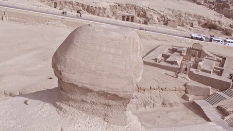 360 Shot Drone for The Sphinx showing Menkaure Pyramid and Khafre Pyramid in background in Giza at day