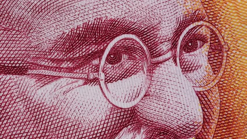 Mahatma Gandhi on India 200 rupee banknote macro slow rotating. Indian money currency bill. Stock video footage
