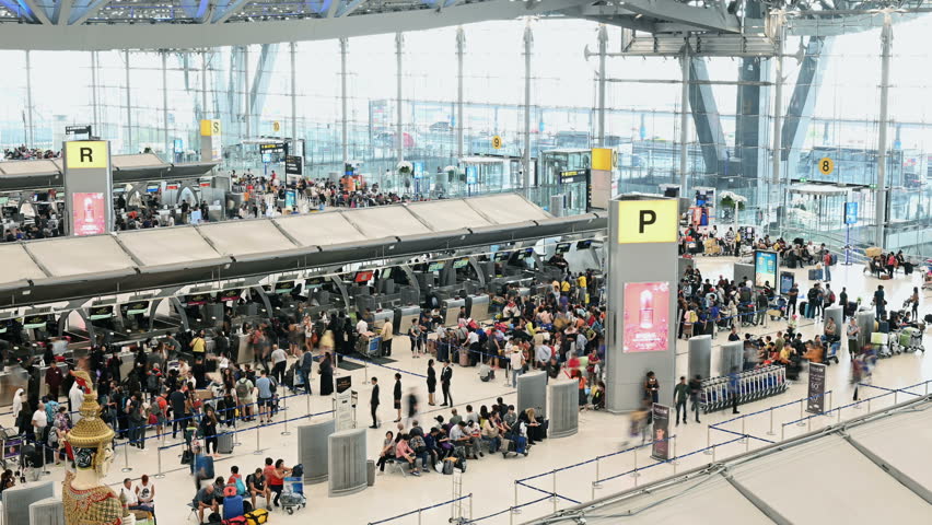 Bangkok, Thailand - January 8, 2019 : Time lapse of unidentified passengers at check in counter hall in Suvarnabhumi Airport