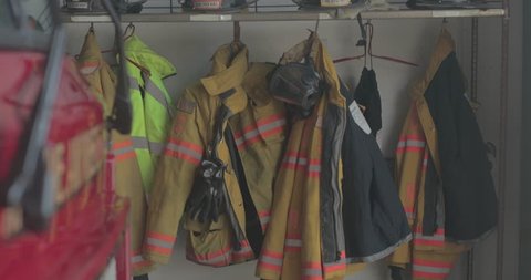 Firefighter Helmets Coats Hang On Equipment Stock Footage Video (100% ...