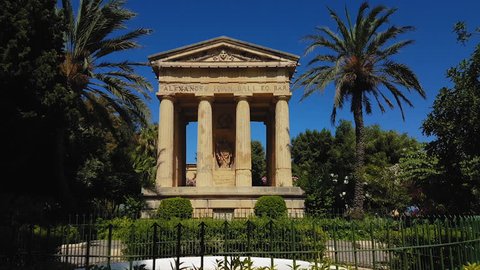 Valletta, Malta monument to Sir Alexander Ball. Day view of 1810 neoclassical temple dedicated to British admiral Sir Alexander Ball, at the Lower Barrakka Gardens.