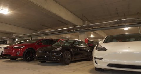 Low angle footage Tesla at supercharger