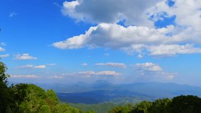 4K time lapse video of mountains view with clouds flowing in Huai Nam Dang national park, Thailand.