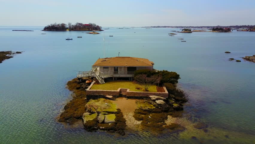 Aerial view of a house on a small island