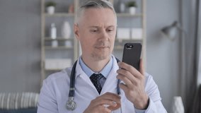 Online Video Chat via Phone by Senior Doctor