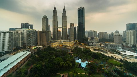 KUALA LUMPUR, MALAYSIA - DECEMBER 25 2018 : Time lapse view overlooking a city center skyline during day from aerial view in Kuala Lumpur, Malaysia. Prores 4k
