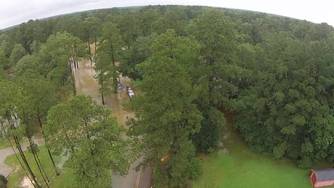 Denham Springs, LA / United States - 08 13 2016: Louisiana Flood August 2016 Unnamed Storm Drone Footage Amite River City of Watson Boats on Bend Road