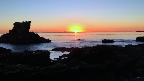 Nice sunset over Catalina Island from Little Corona del Mar beach in Newport Beach, Southern California, HD
