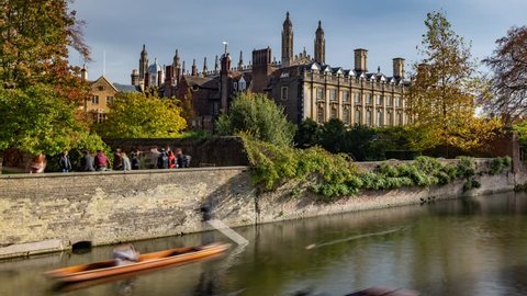 Time lapse panning view of boats punting on the river Cam in Cambridge by Clare College