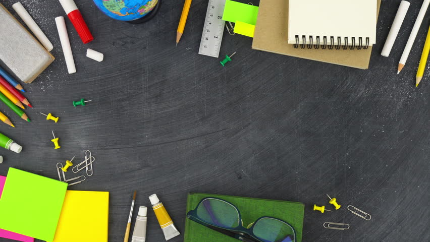 education background colorful stationery on blackboard Stock Footage