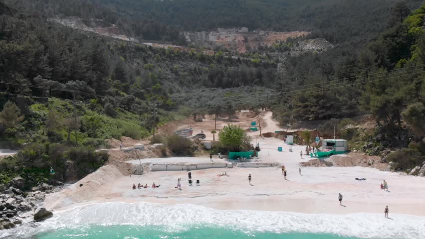 Tilting Aerial Pullback View of Secluded Paradise Beach. Thasos, Greece.