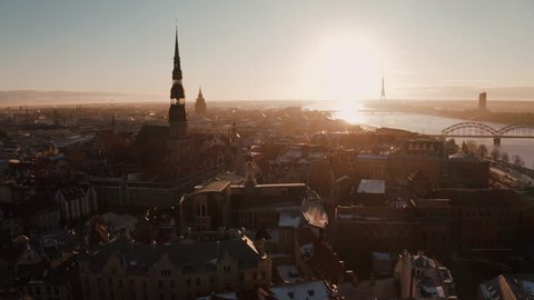 Beautiful aerial view of the Riga old town during sunset or sunrise during sunny winter day in Latvia. Amazing Riga.