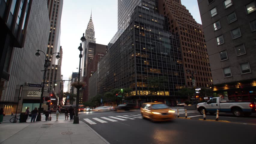 Day to Night Hyperlapse in Midtown Manhattan.  Sunset time-lapse with dolly drive and tilt camera movement.