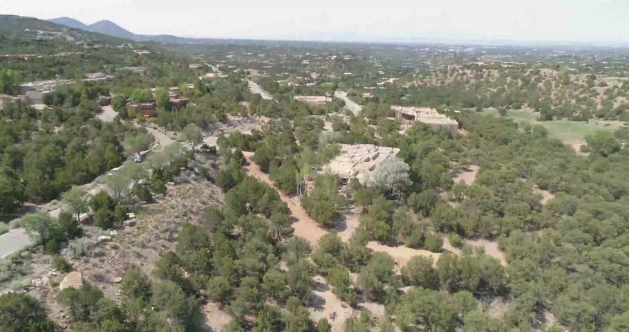 Aerial footage of Santa Fe New Mexico foothills residential houses
