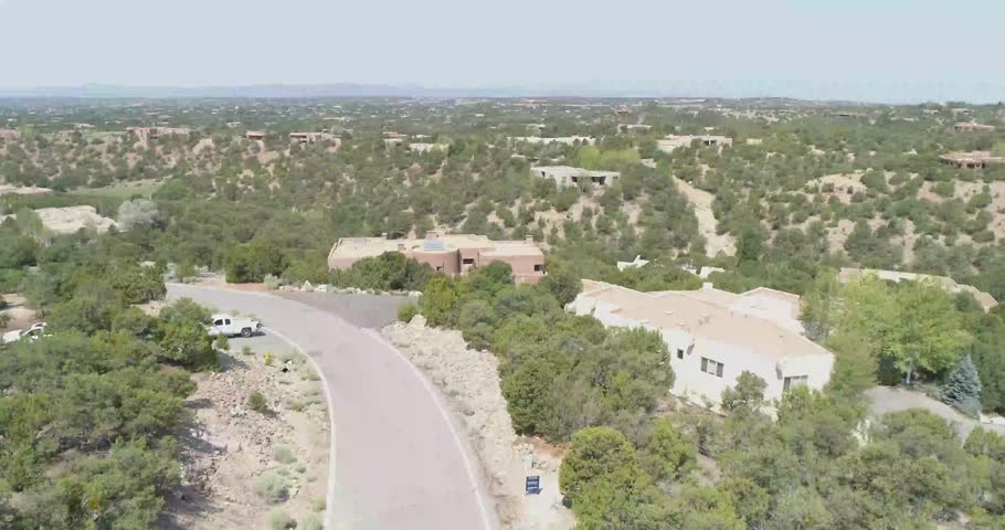 Aerial footage of Santa Fe New Mexico foothills residential houses