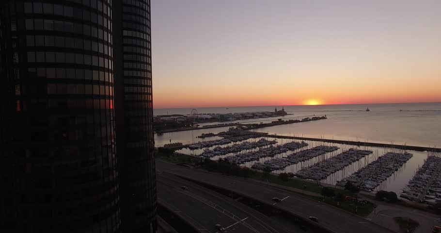 Sunset Reflecting on Building by Lake Michigan 