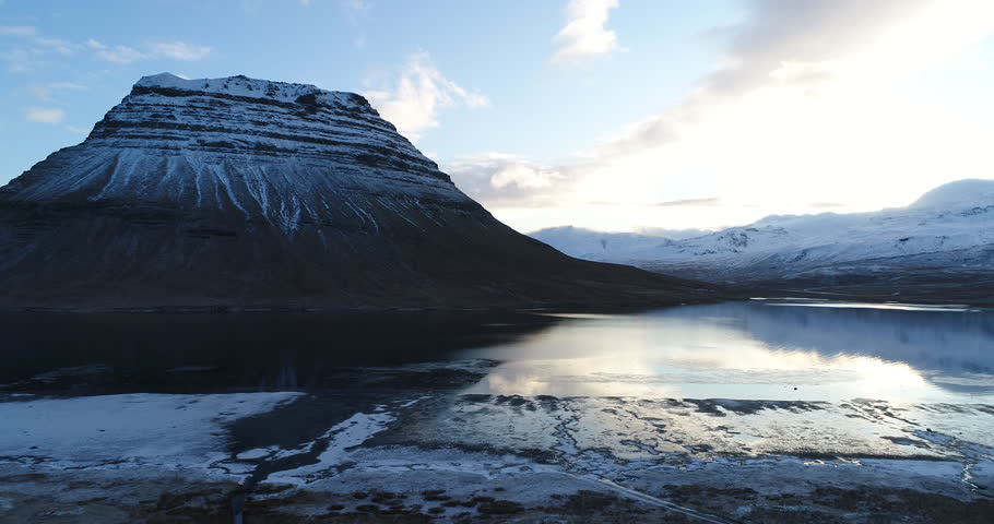 Aerial view of Kirkjufell mountain in winter, Iceland Royalty-Free Stock Footage #1022770879