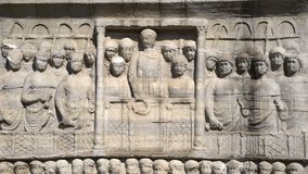 Closeup, still perspective of aged sculpture carved and chiseled on brick wall - Powered by Shutterstock - Get 15% off with code: PIKWIZARD15