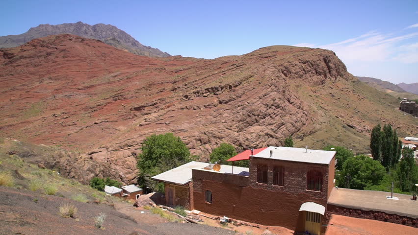 Aerial view of old buildings with vegetation