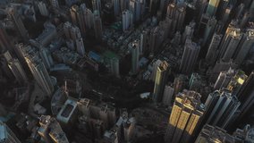 Fly above Urban city scene around residential area in sunset, Hong Kong , 4k high resolution video
