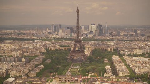 Large view of the city of Paris with the Eiffel Tower and the La Defense district behind, France
