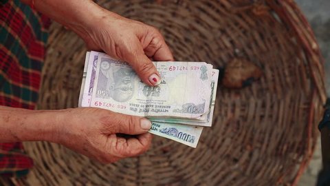 A Man Recounts Indian Rupee Stock Footage Video 100 Royalty Free 1025891567 Shutterstock